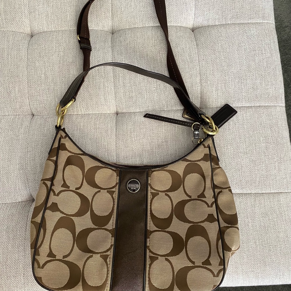 coach brown and tan colored bag